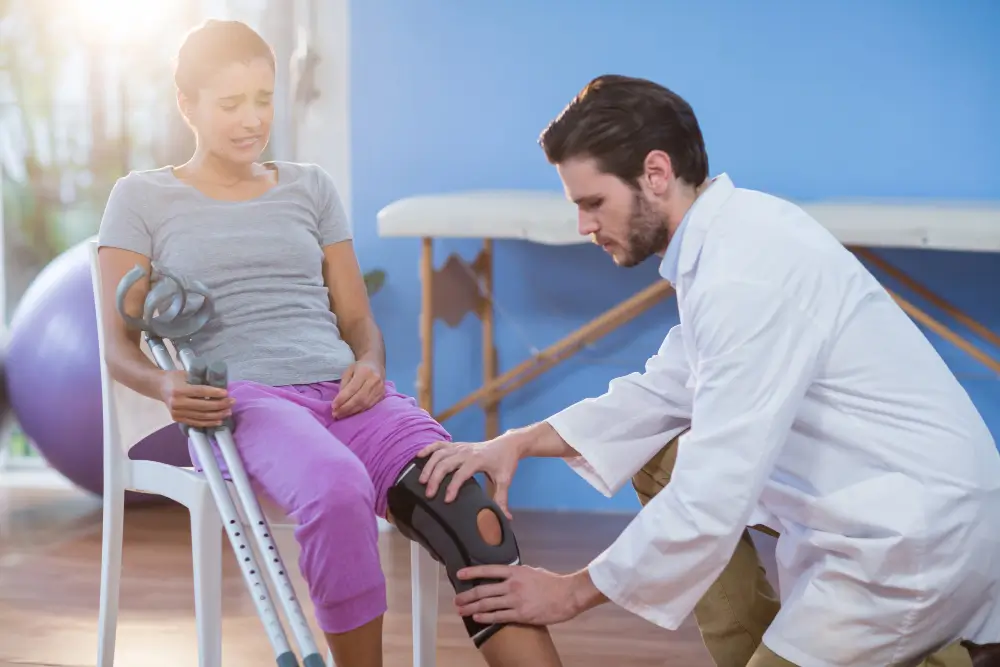 Orthopaedic surgeon performing partial knee replacement surgery for localized knee arthritis in Powai.