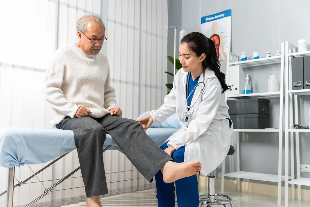 Patient undergoing evaluation for revision knee replacement surgery by Dr Sanjeev Jain